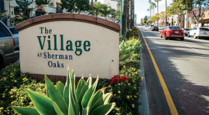 the village at sherman oaks sign   